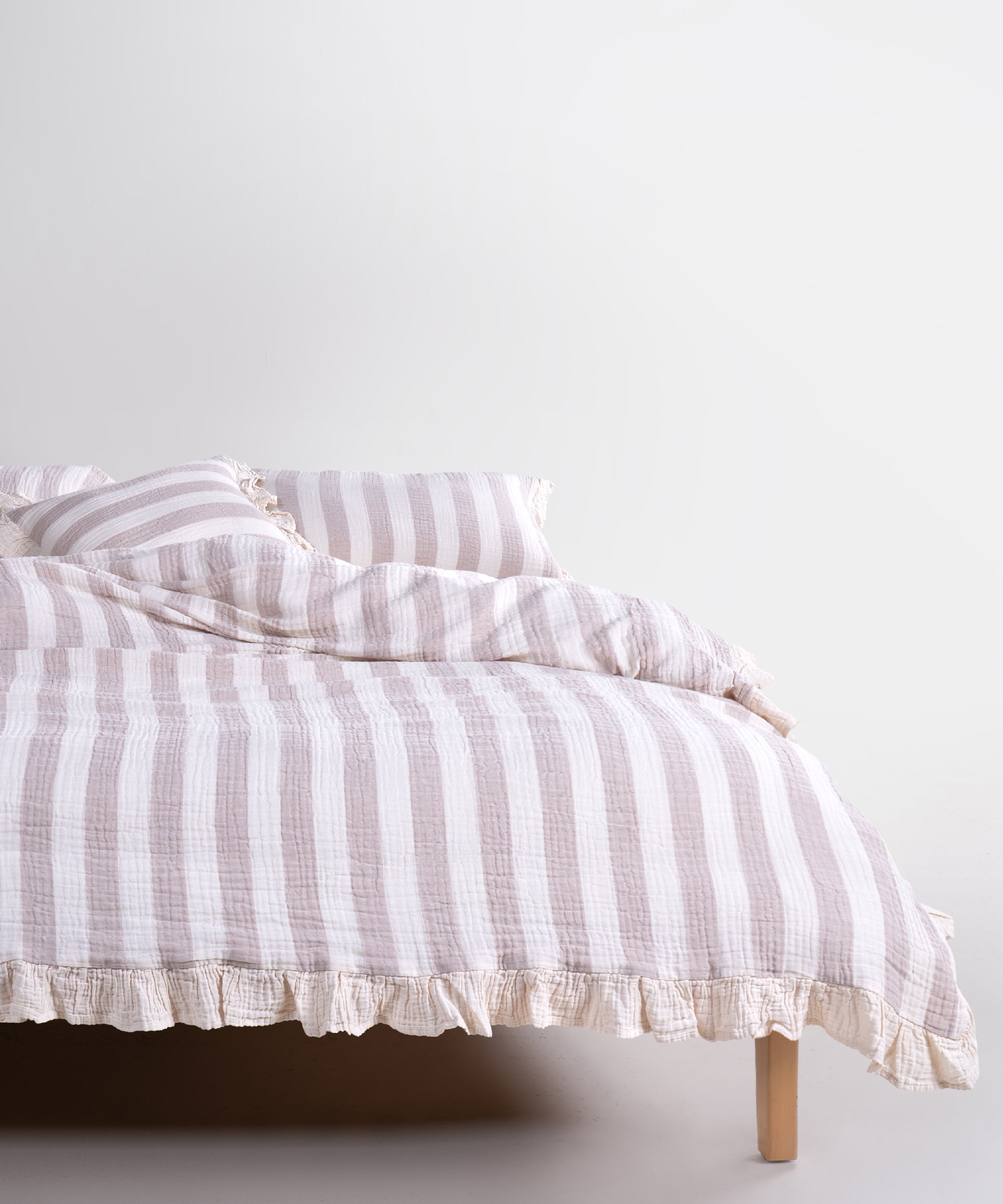 Natural beige striped 100% cotton muslin duvet cover set with ruffled edges, garment washed and yarn dyed, breathable bedding for double, king and super king beds
