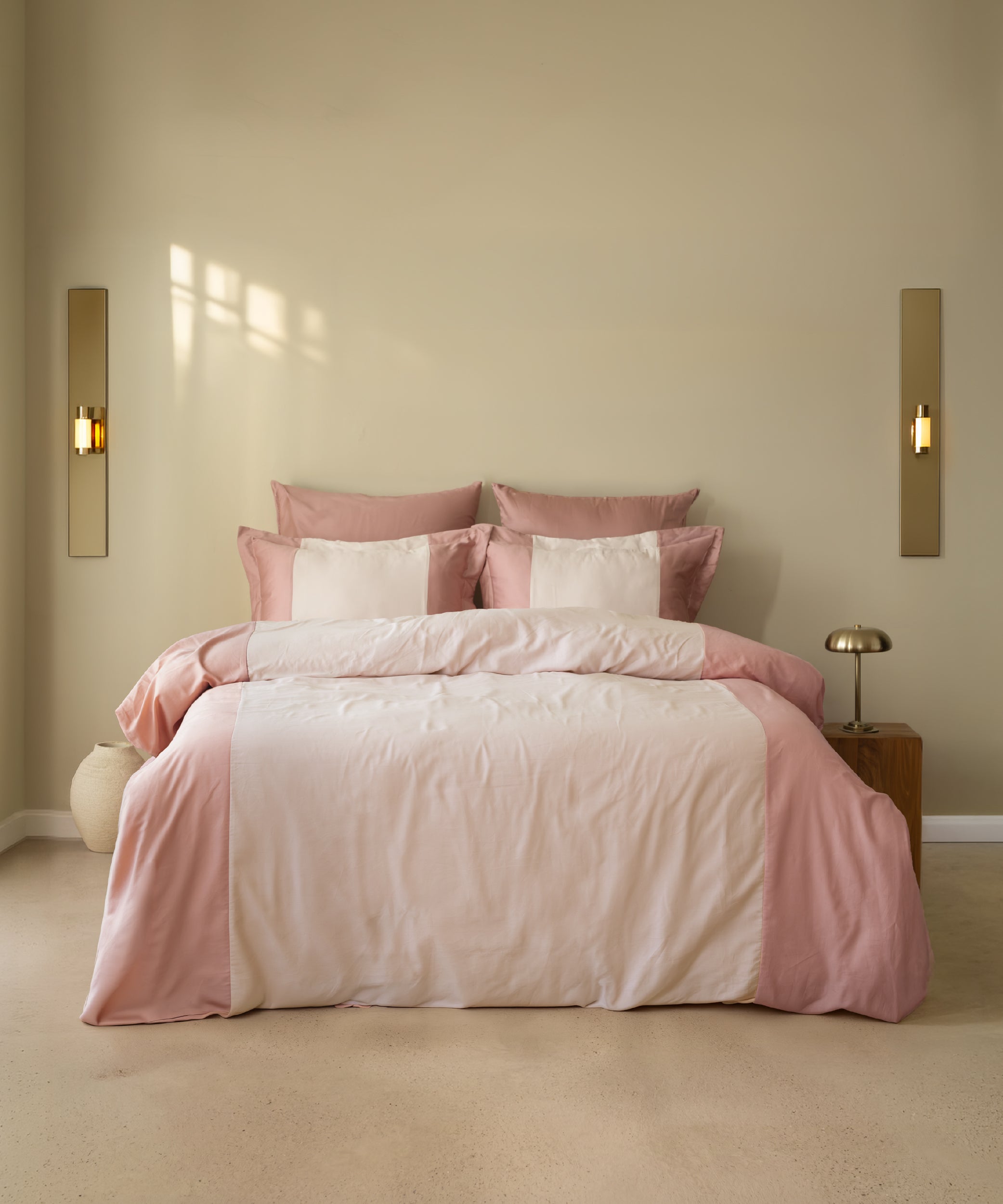 210TC Sateen Duvet Cover Set Old Rose and Pale Mauve in a warm Mediterranean bedroom with brass wall sconces – Limasso London