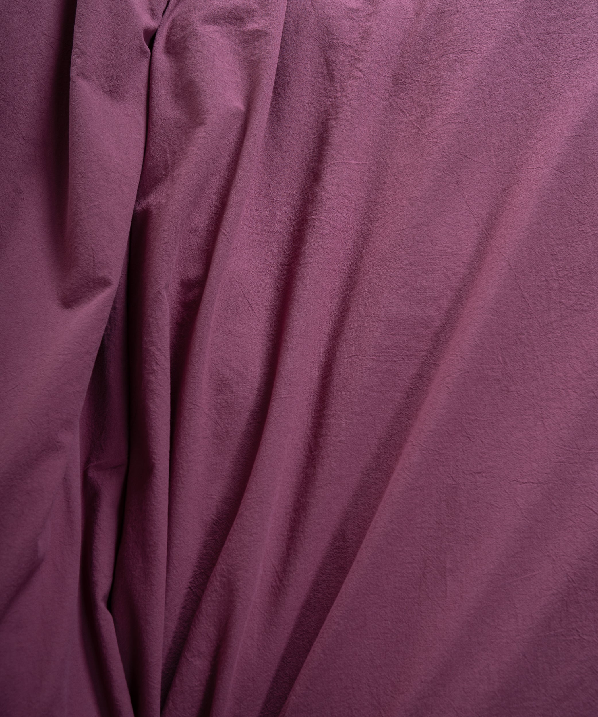 Raspberry cotton duvet cover with button fastening and envelope pillowcase closure in breathable 100% natural cotton.