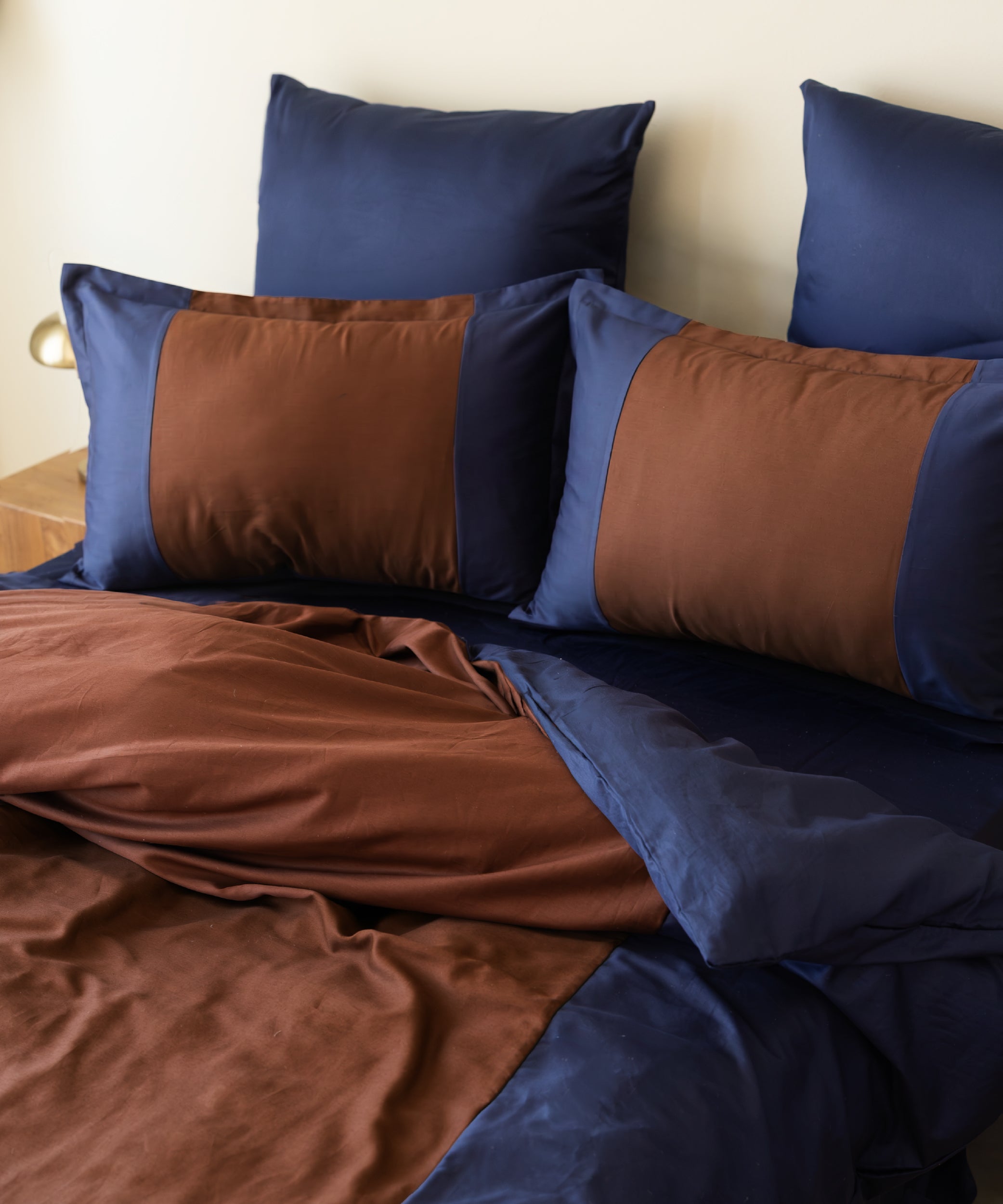 Close-up of 210 thread count cotton sateen fabric showing smooth silky texture and subtle sheen
