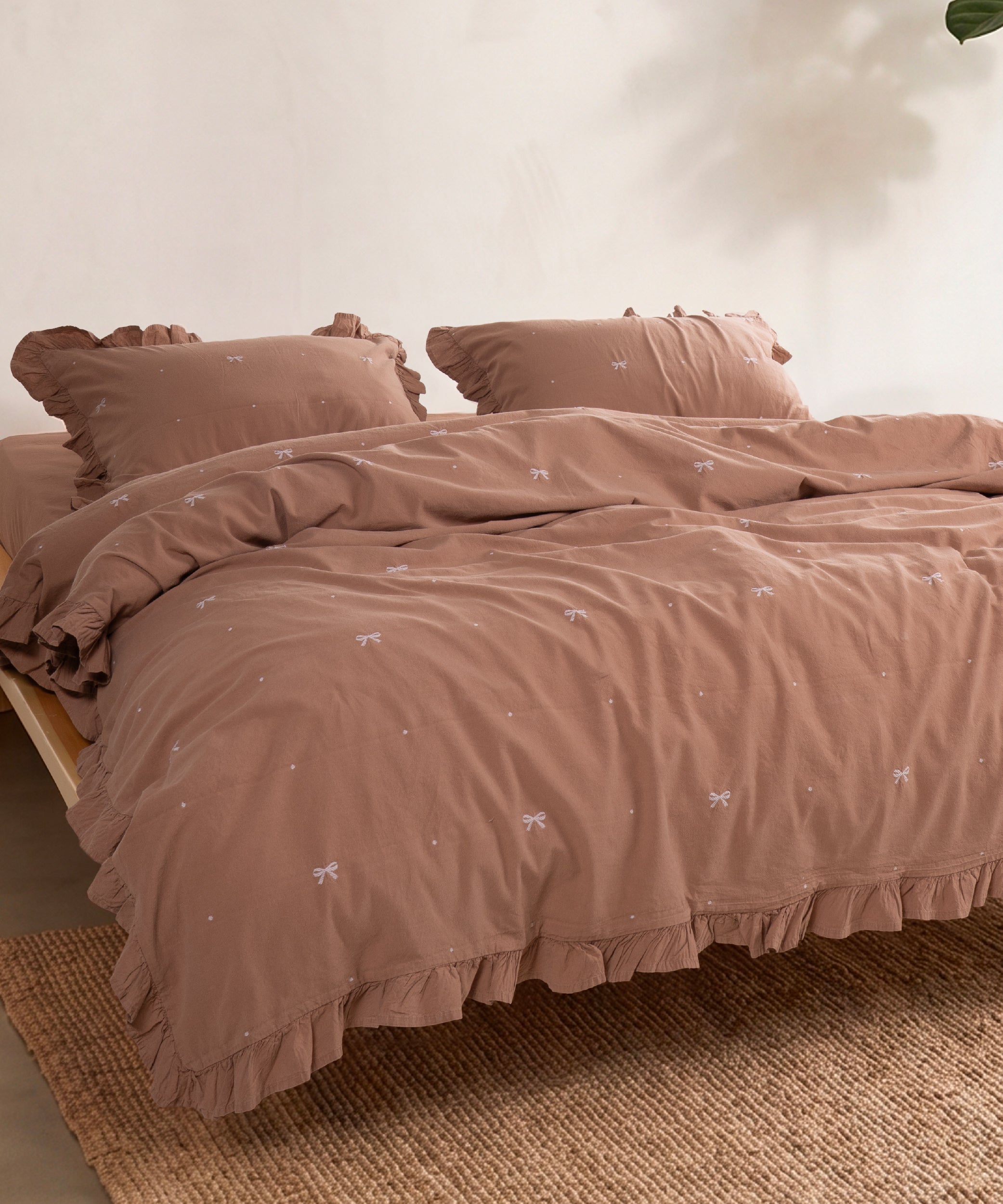 Flowing stonewashed cotton fabric in Wood Smoke showing natural drape and relaxed texture