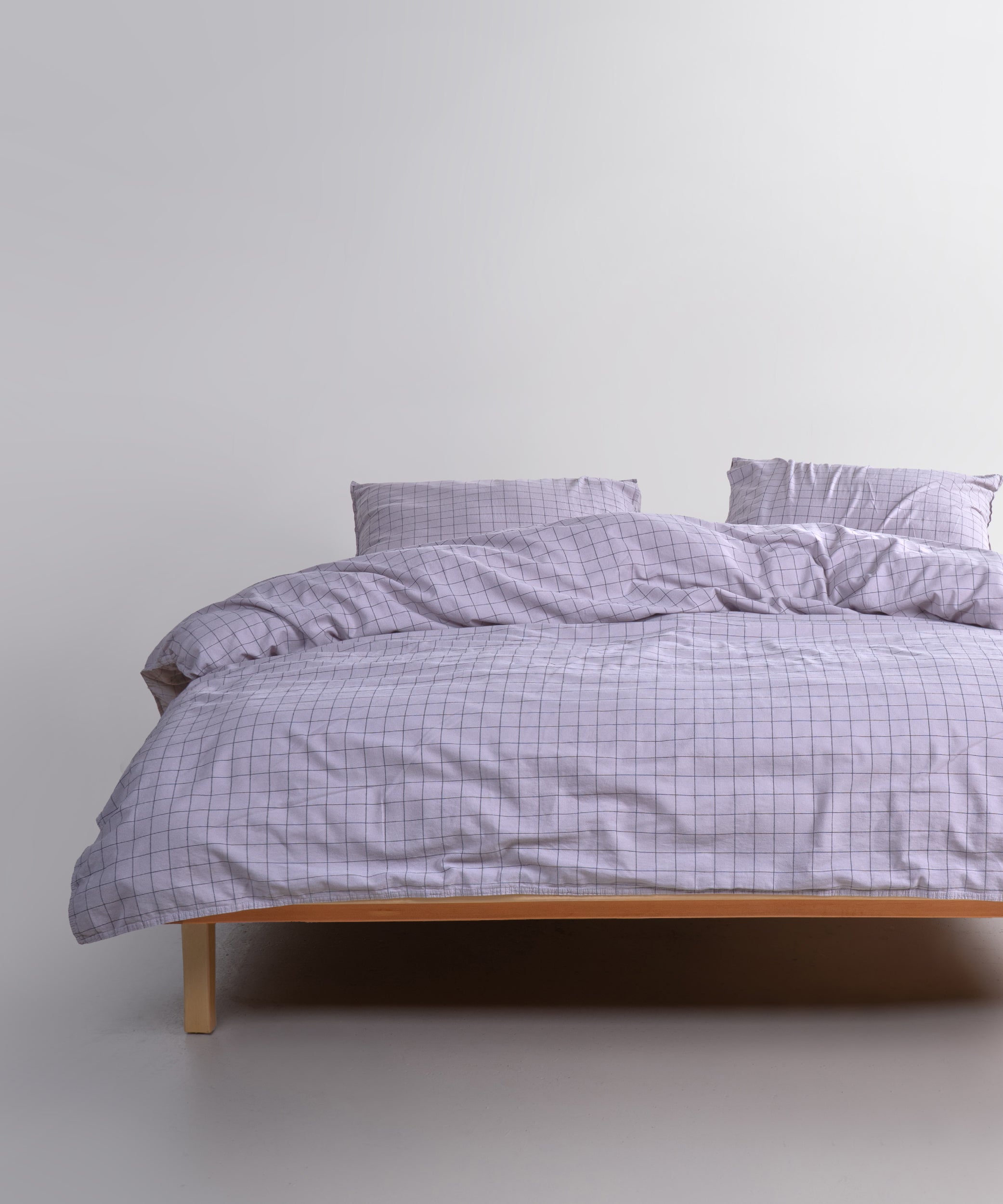 Main view of the Inara duvet cover set in Natural Violet, made from 100% stonewashed cotton with a soft, relaxed finish.