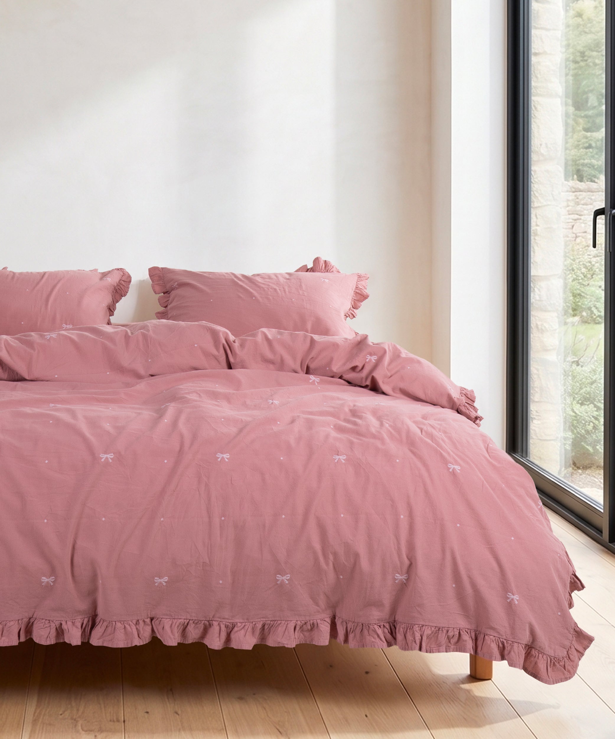Old rose cotton duvet cover set with jacquard ribbon detail styled in a romantic bedroom – Limasso London
