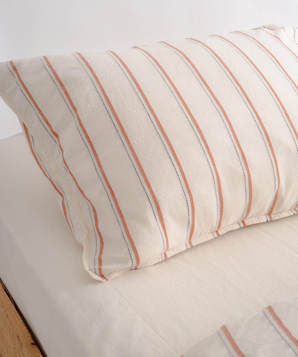 Cotton pillowcase with envelope closure in natural cream with red stripe detailing