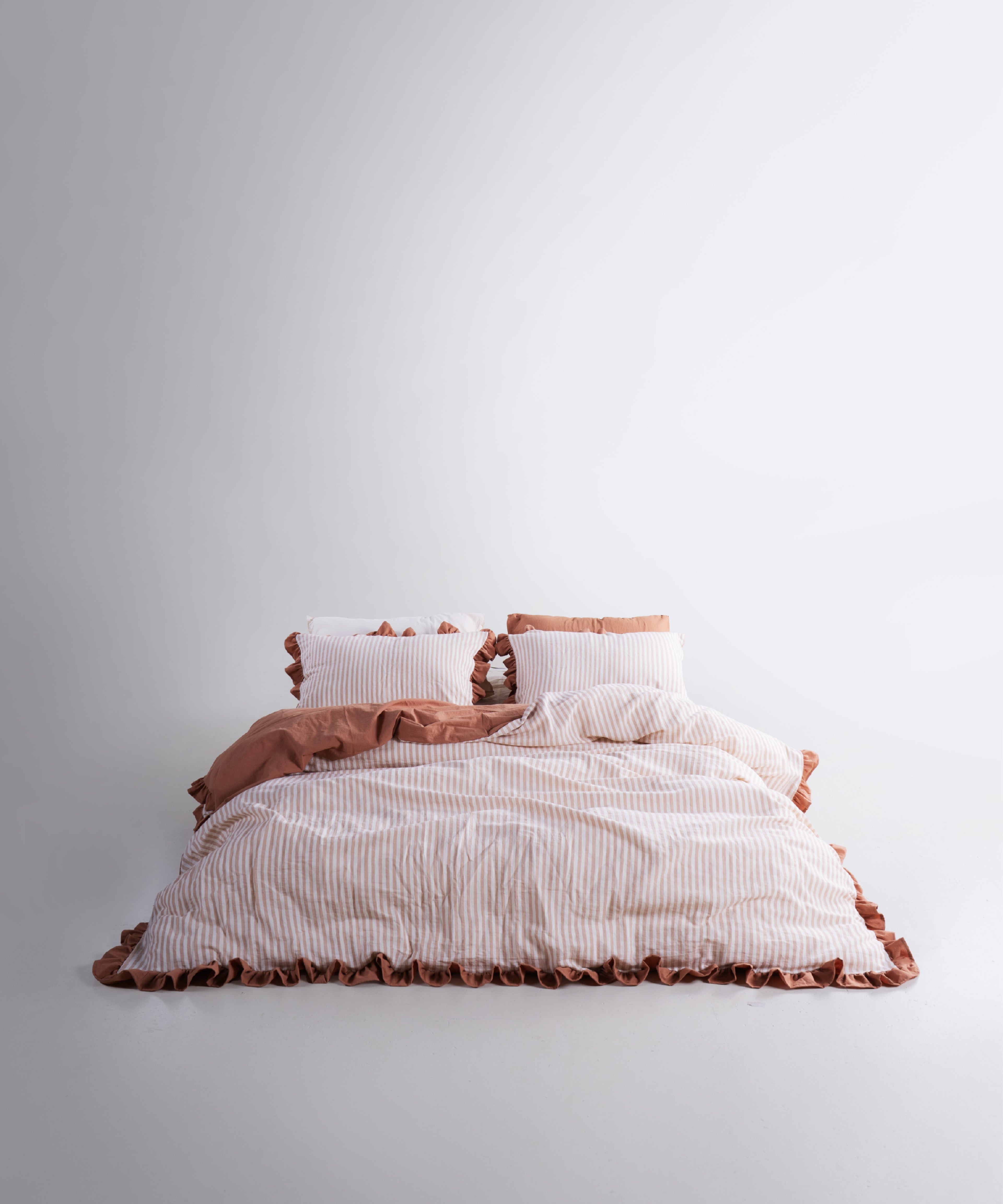 Garmentwashed Marrakesh 100% soft cotton duvet cover set in natural cream with ruffled edges