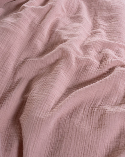 Macro close-up of 100% natural cotton muslin gauze fabric texture in the Esse duvet cover set – Limasso London