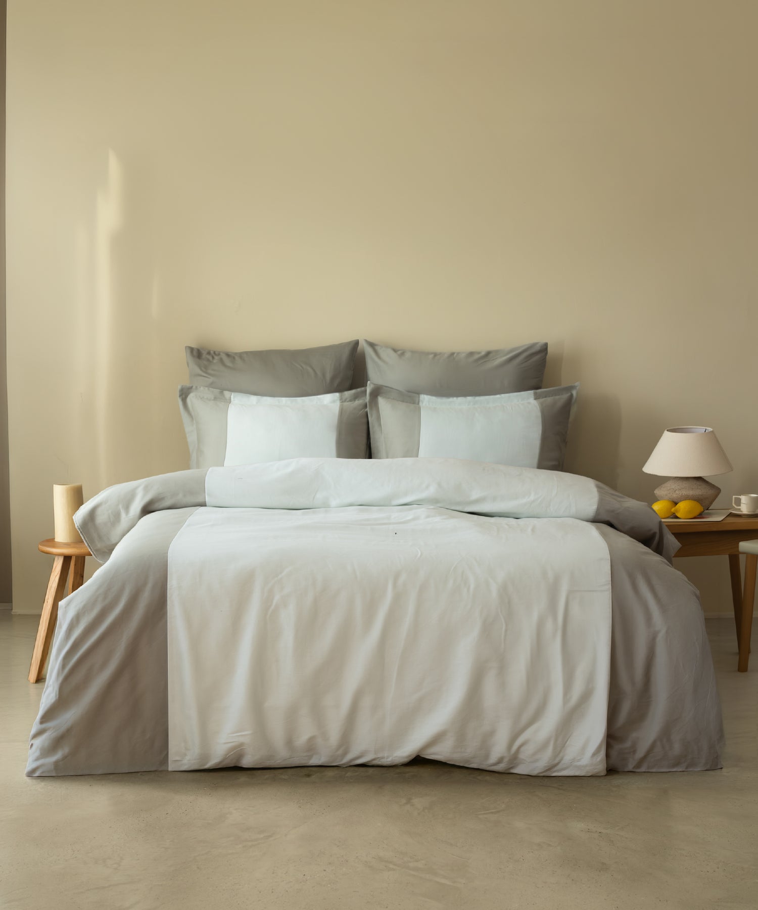 210TC Sateen Duvet Cover Set Mineral Green and Mint in a sunlit Mediterranean bedroom with lemon and lamp – Limasso London