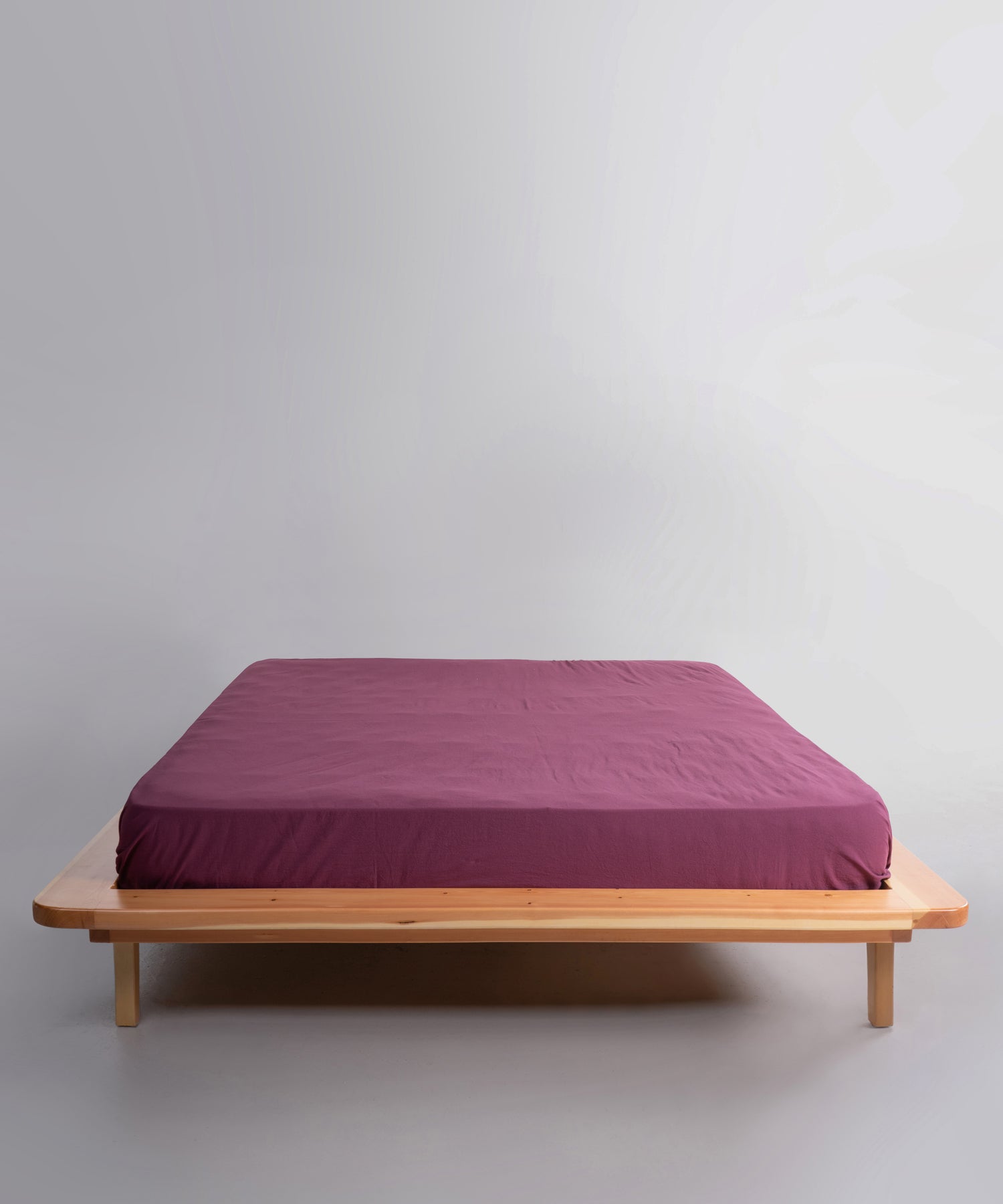Stonewashed 100% cotton fitted sheet in Raspberry, offering a soft, breathable and relaxed finish. Designed for UK and US beds with deep fit options for a secure and stylish look.
