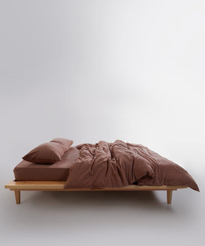 Double-needle stitching, button closure and breathable fabric for long-lasting UK bedding quality.