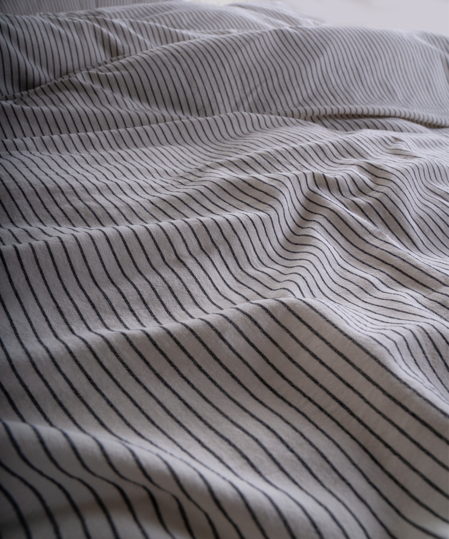 100% cotton pillowcase with envelope closure in cream and black stripe design
