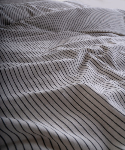 100% cotton pillowcase with envelope closure in cream and black stripe design