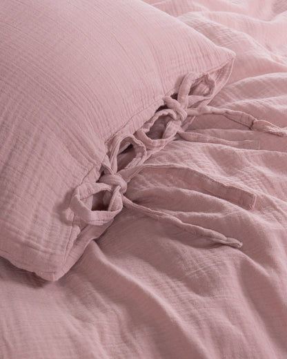 Close-up of tie detail and envelope closure on Esse Old Rose muslin pillowcase – Limasso London