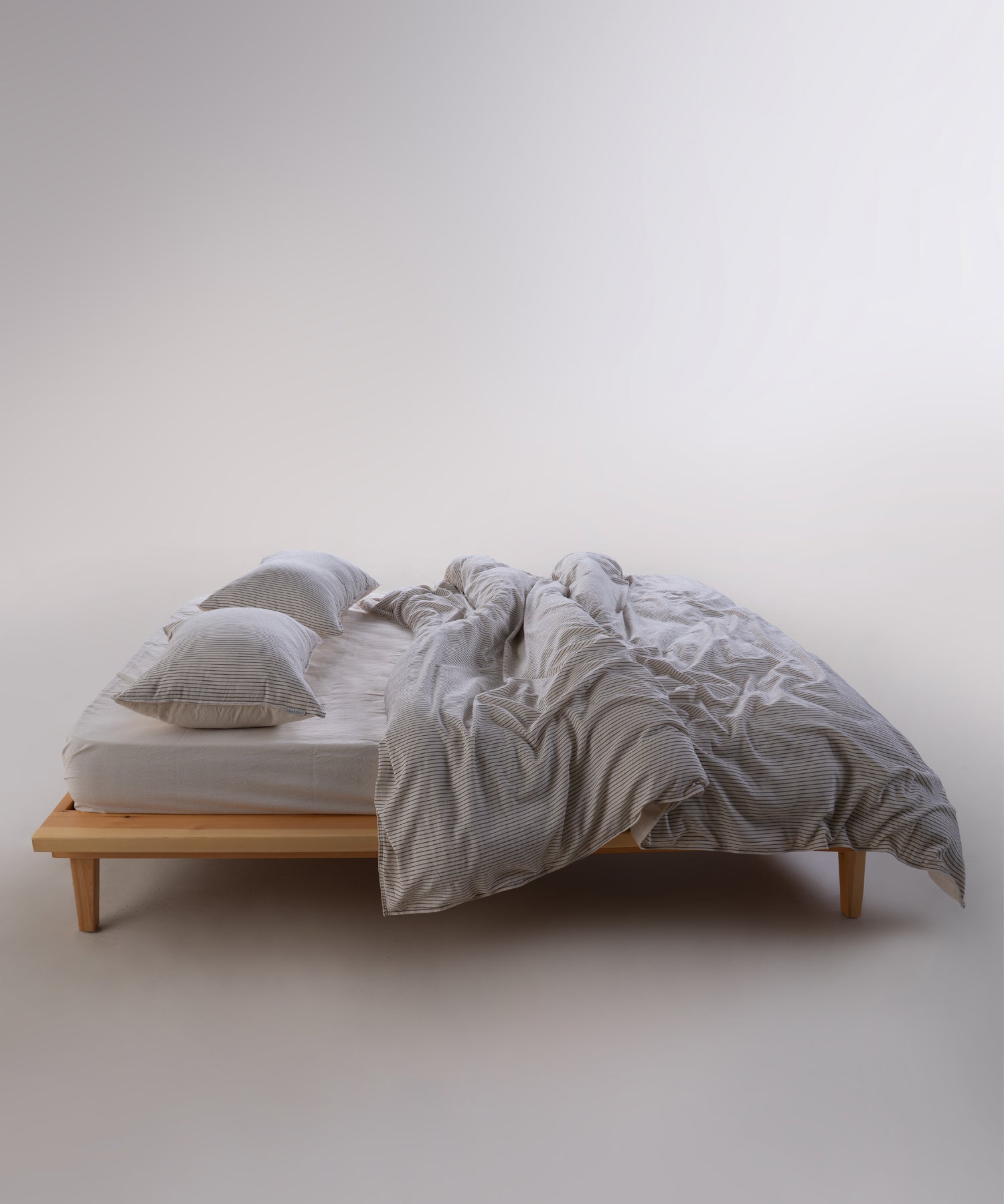 Natural cream 100% cotton duvet cover set with fine black stripes, garment washed soft bedding for UK and US bedrooms