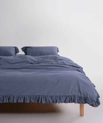 Stonewash exclusive 100% soft cotton duvet cover set in natural grey, styled on a UK bed with a relaxed stonewashed finish