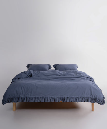 Natural grey stonewashed cotton duvet cover set creating a calm and modern UK bedroom interior
