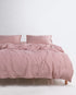 Esse Old Rose 100% cotton muslin gauze duvet cover set on a double bed with matching pillowcases – Limasso London