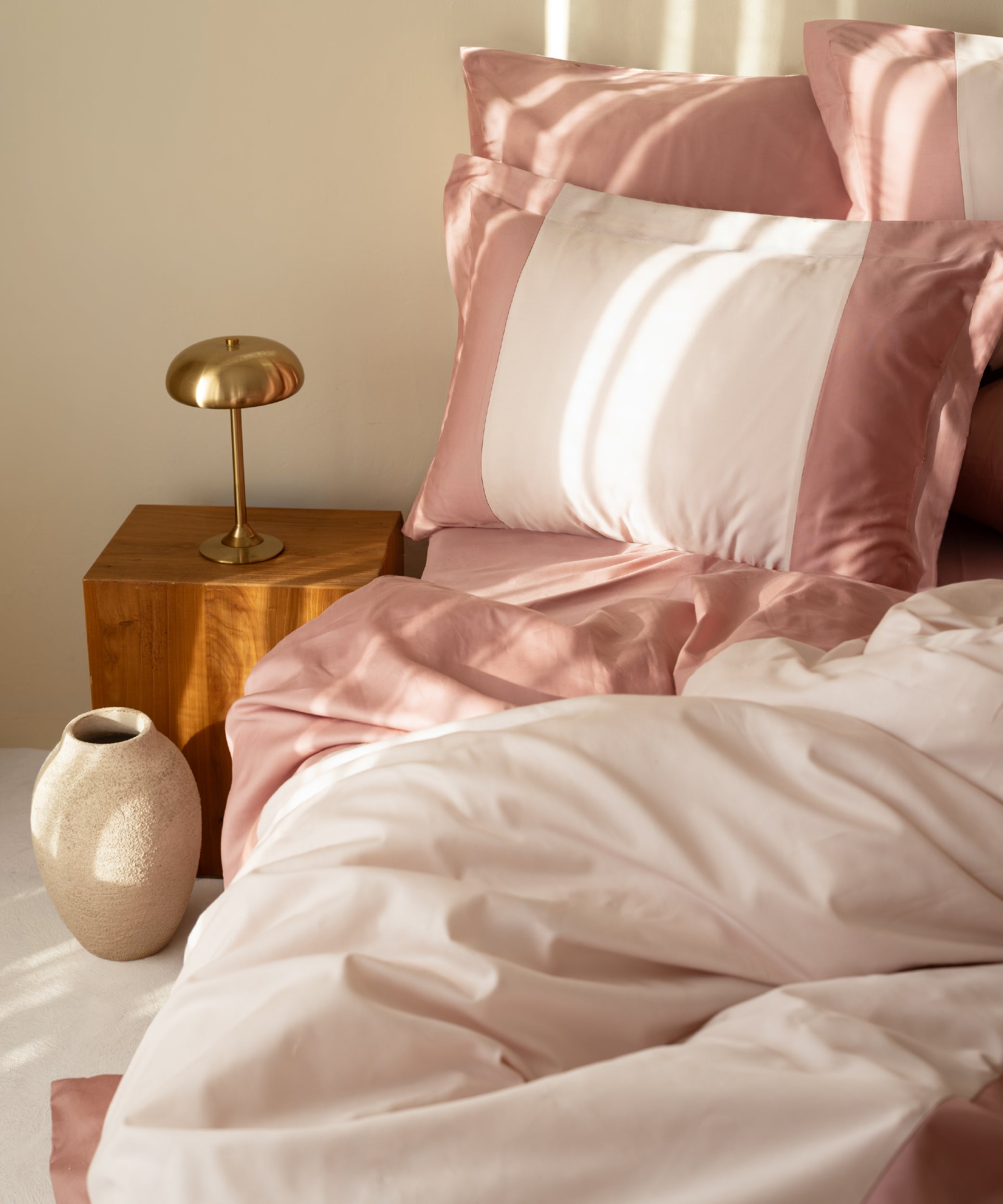 210TC Sateen Duvet Cover Set Old Rose and Pale Mauve angled view with brass lamp and ceramic vase – Limasso London
