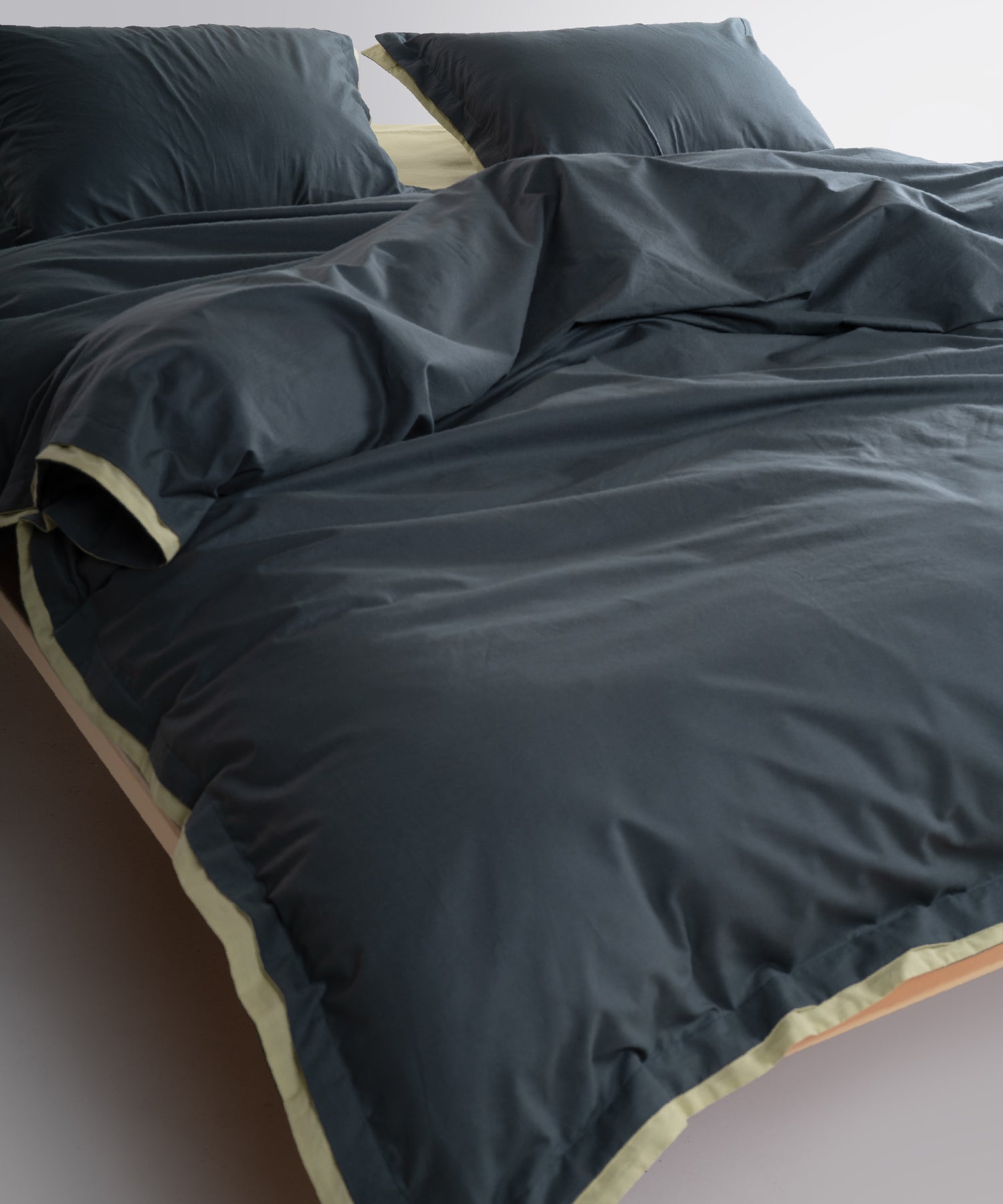 Soft breathable 100% cotton fabric texture in dark green colour