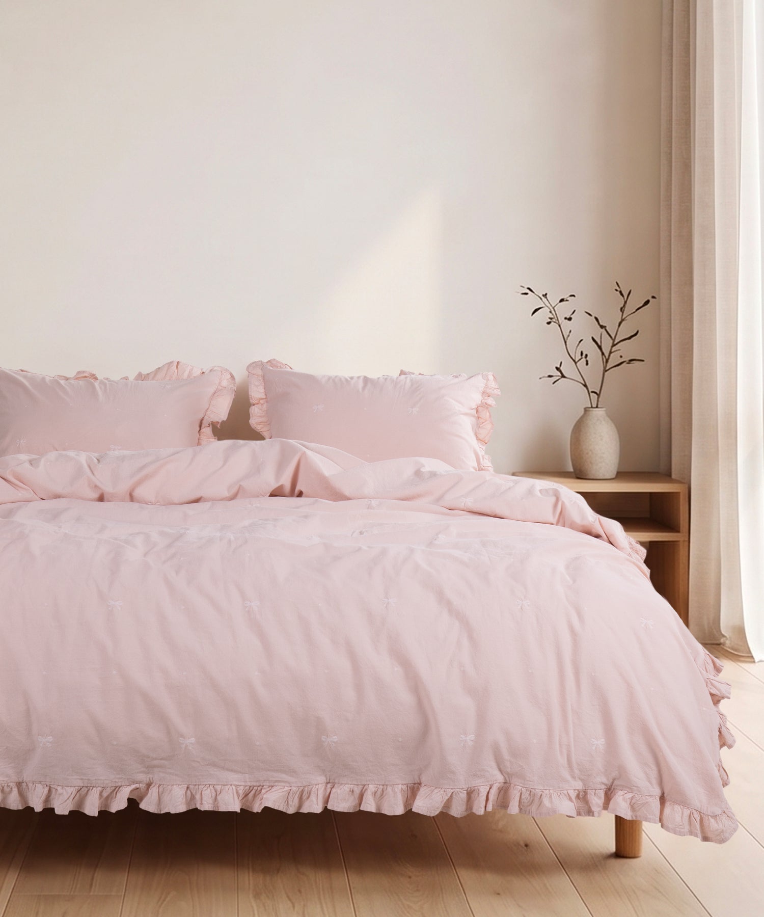 Pristine cotton pillowcase with envelope closure and elegant ruffled edge detail