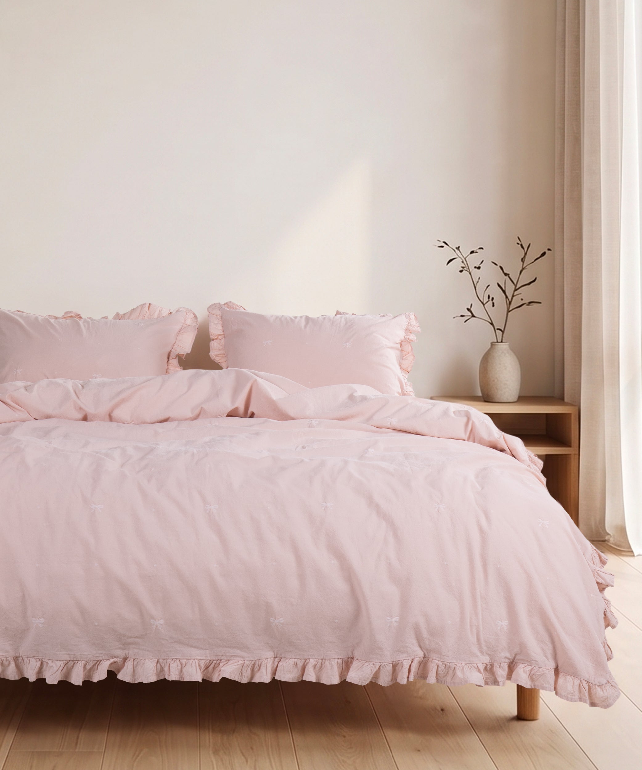 Pristine cotton pillowcase with envelope closure and elegant ruffled edge detail