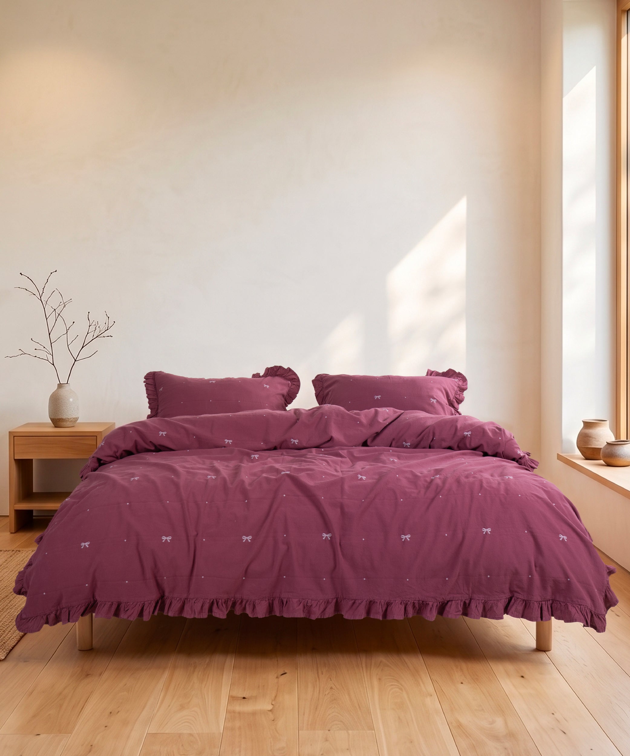 Stonewashed Raspberry cotton duvet cover set styled in warm and stylish UK bedroom interior