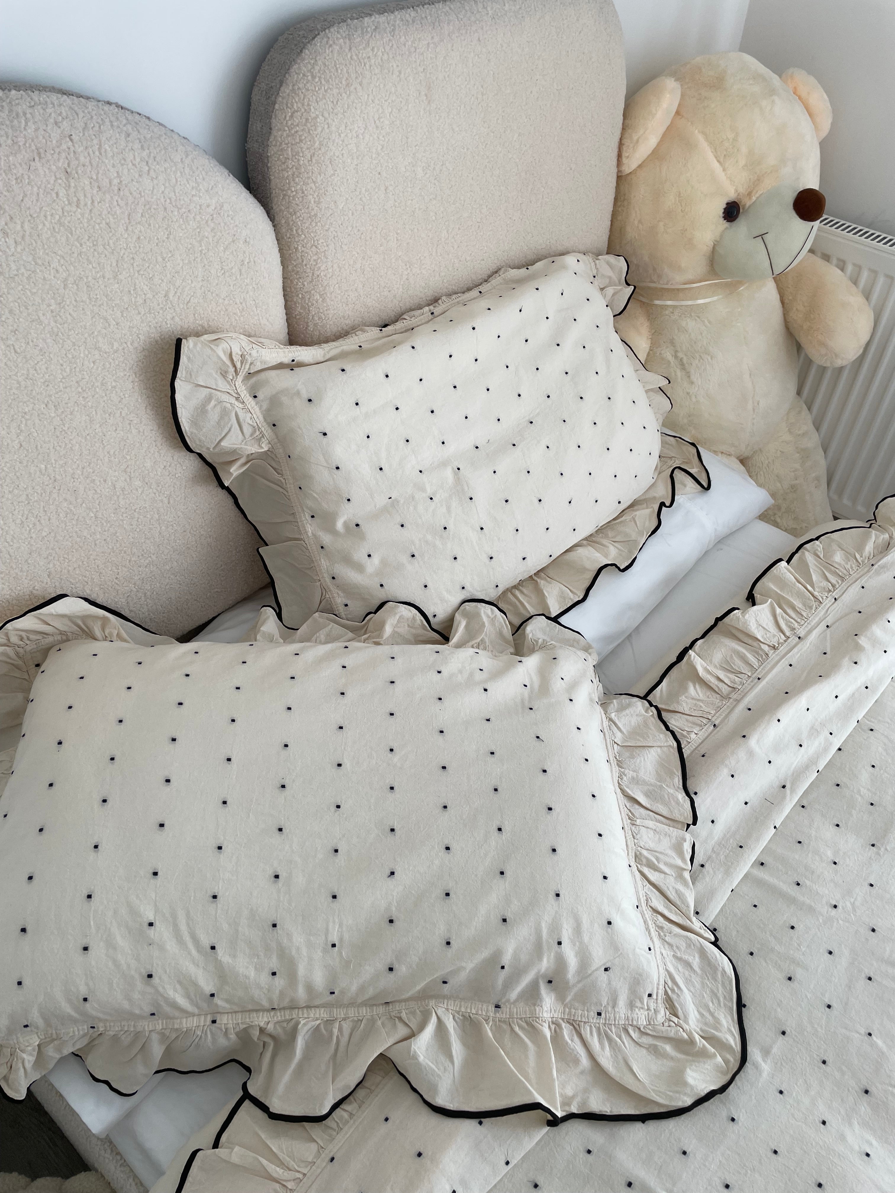 Real home customer photo showing Limasso London 100% cotton duvet cover set with embroidered ruffle trim – soft, breathable, UK sizing
