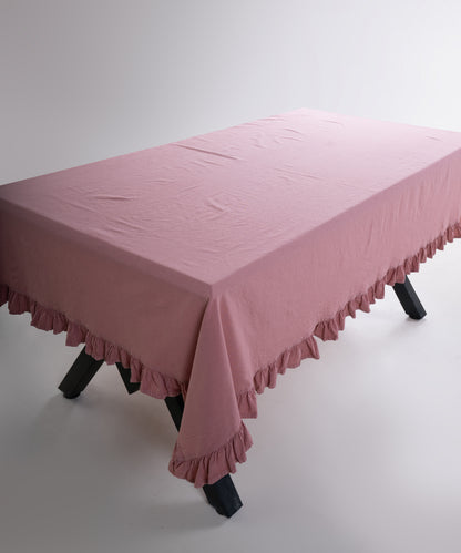 Detailed view of ruffled edge on Old Rose 100% cotton stonewashed tablecloth, elegant pink dining table linen UK