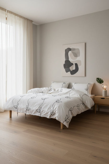 Main view of the Snow White duvet cover set with butterfly embroidery, made from 100% stonewashed cotton for a soft, relaxed finish.