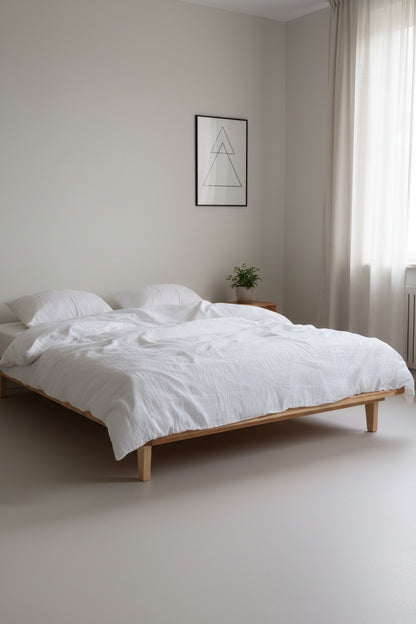 Cloud 100% Cotton Gauze-Muslin Duvet Cover Set Snow White in a sunlit minimalist bedroom – Limasso London