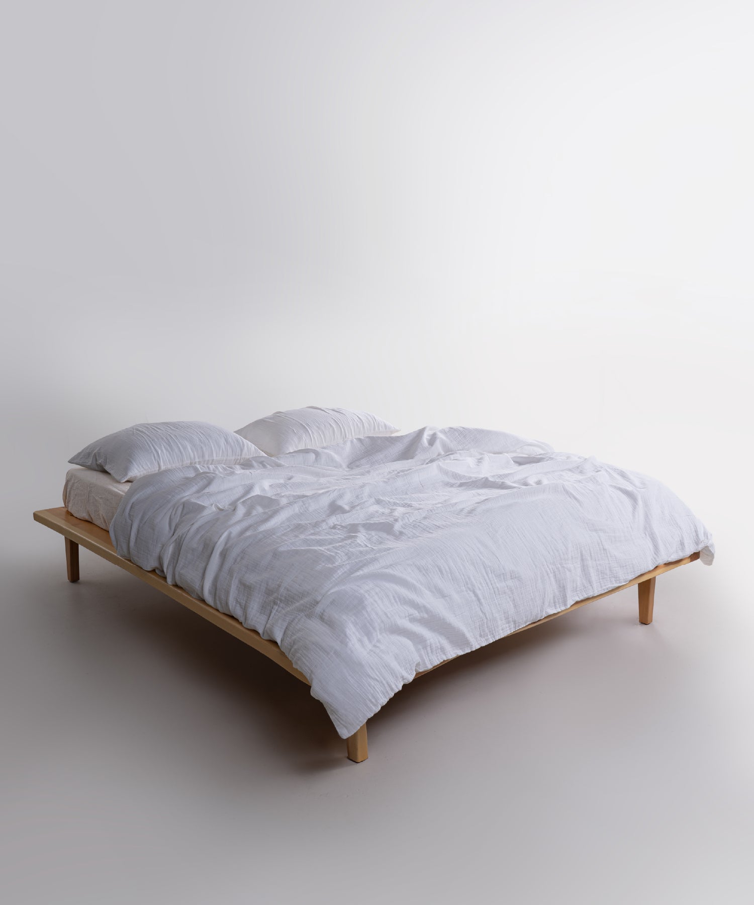 Close-up of Cloud Snow White muslin gauze duvet cover and pillowcases showing soft crinkle cotton texture – Limasso London