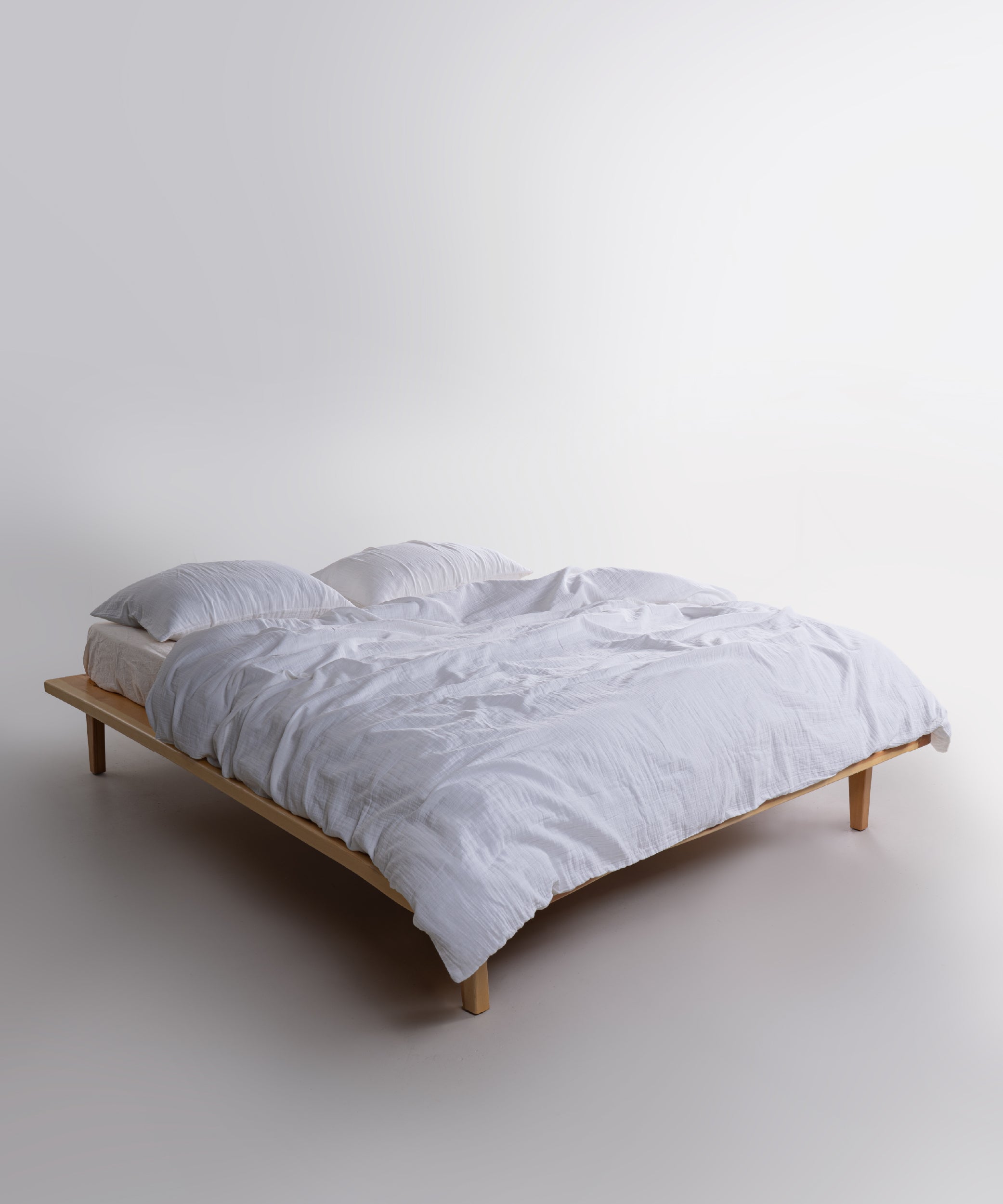 Close-up of Cloud Snow White muslin gauze duvet cover and pillowcases showing soft crinkle cotton texture – Limasso London