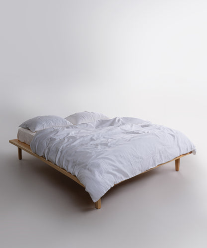 Close-up of Cloud Snow White muslin gauze duvet cover and pillowcases showing soft crinkle cotton texture – Limasso London