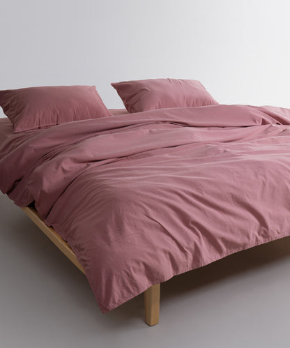 Flowing Old Rose stonewashed cotton duvet cover showing natural drape and relaxed finish