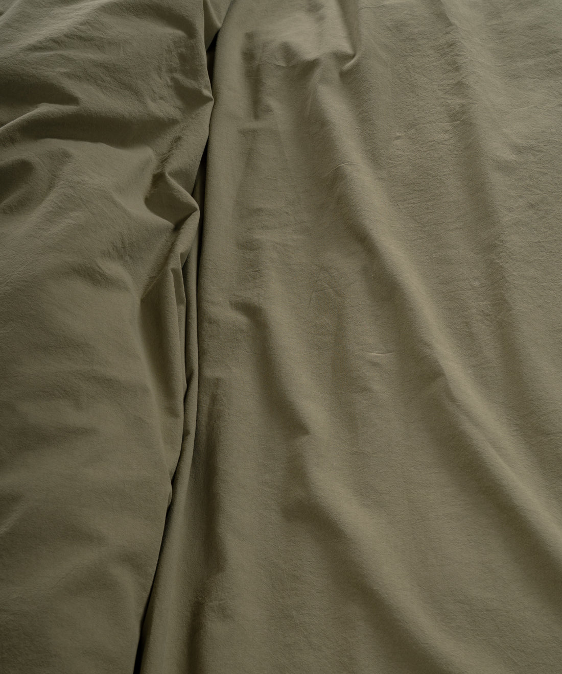 Soft Stonewashed Cotton Fabric | Olive Bedding Texture Detail