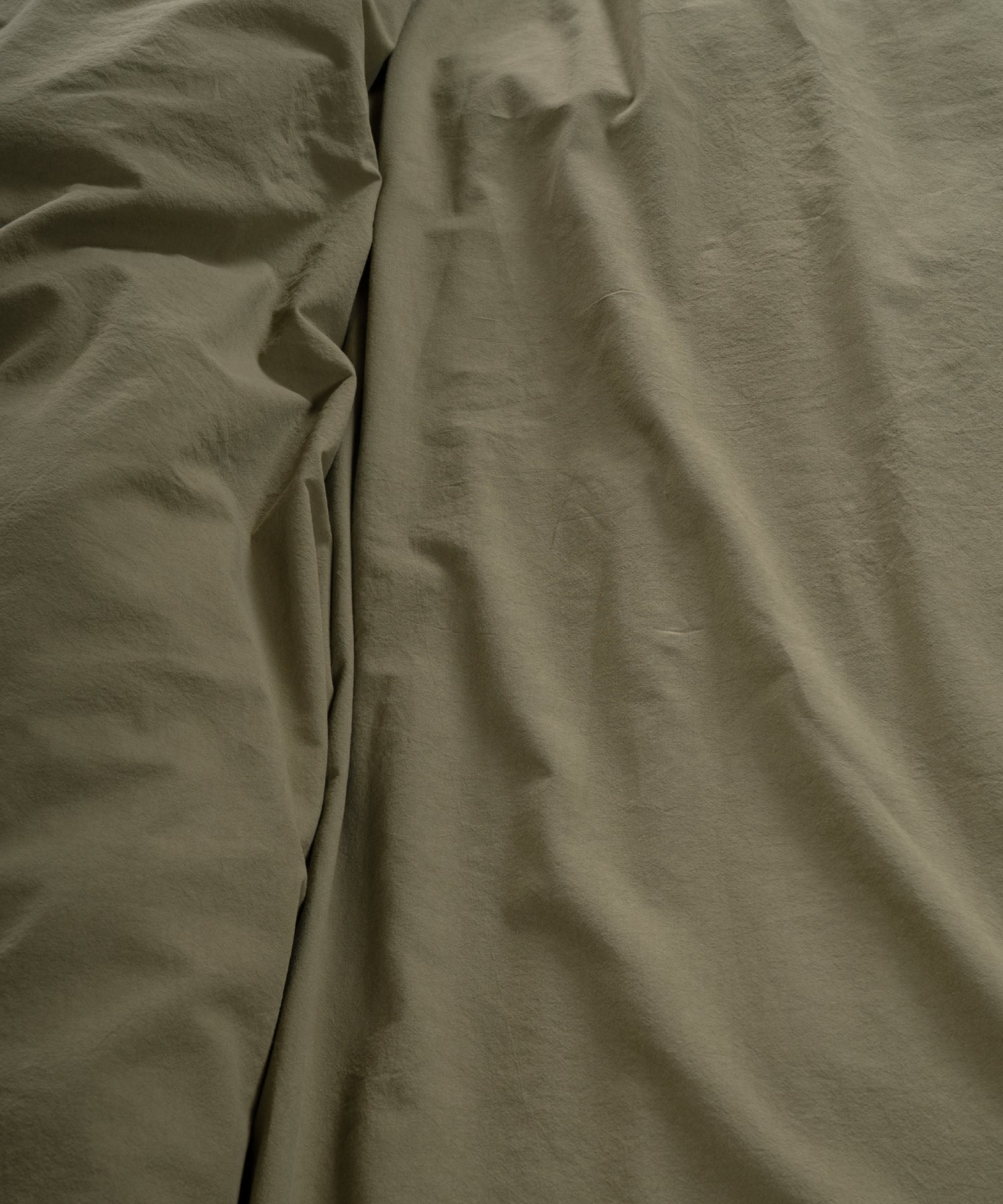 Soft Stonewashed Cotton Fabric | Olive Bedding Texture Detail