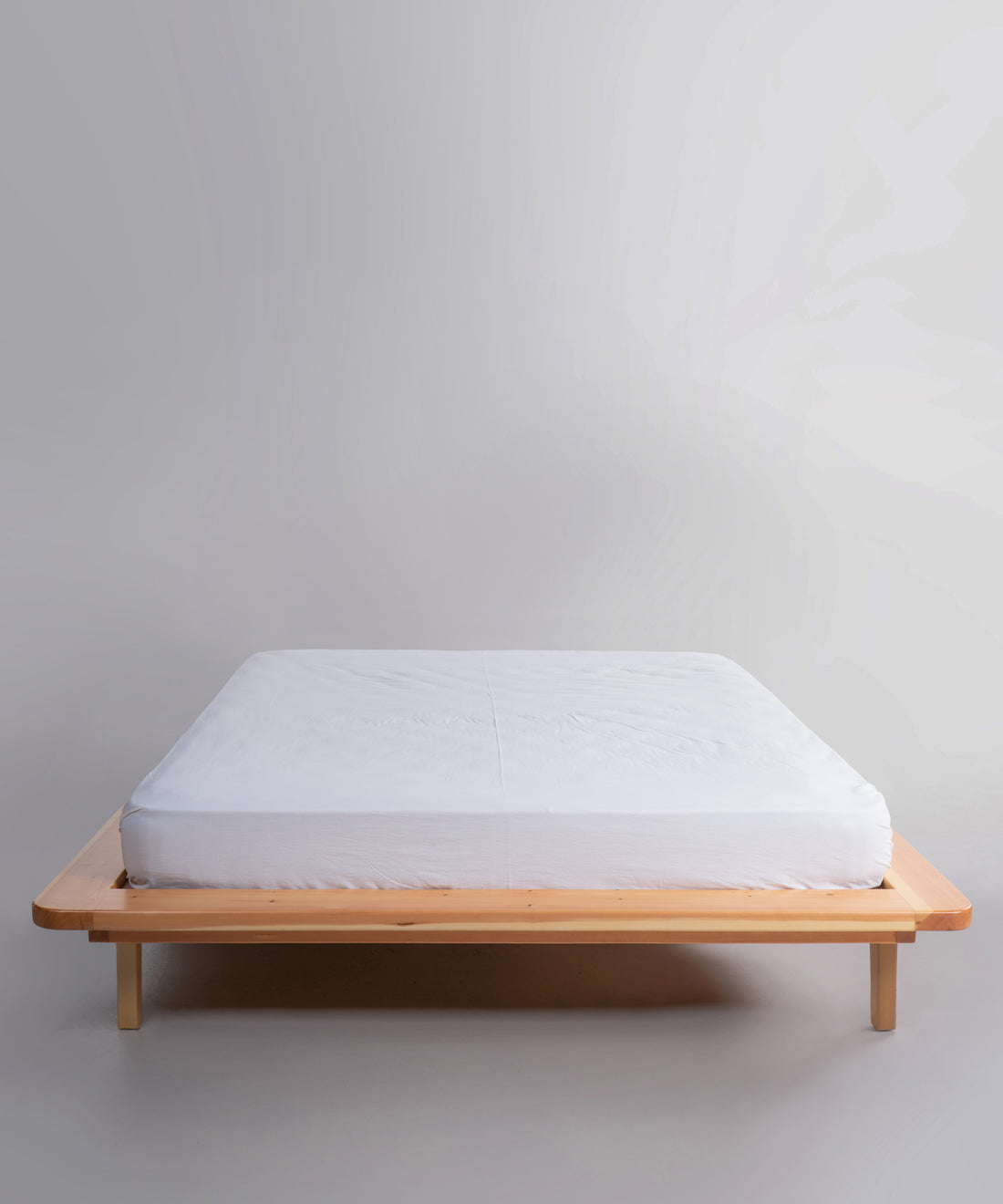 White stonewashed 100% cotton fitted sheet in Snow White colour, breathable deep pocket bedding for UK and US mattresses by Limasso London.