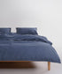 Stonewash 100% soft cotton duvet cover set in natural grey, styled on a UK bed with a relaxed stonewashed finish