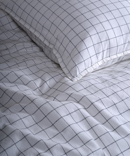 Close-up of the stonewashed 100% cotton fabric showing its naturally soft feel and gently lived-in texture in Snow White.