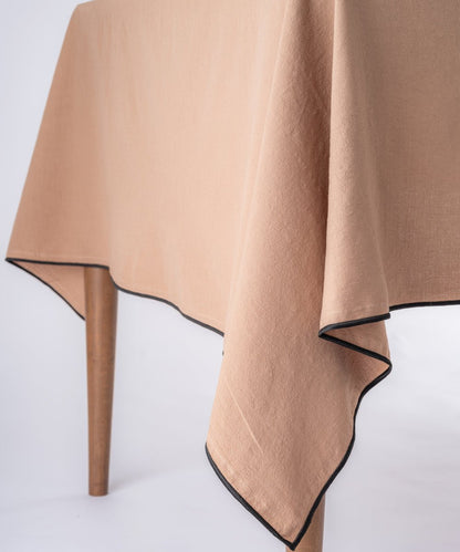 Wood Smoke grey embroidered cotton tablecloth styled in modern dining room setting, rectangular stonewashed table linen UK