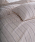 Cotton pillowcase with envelope closure in natural cream and navy stripe design