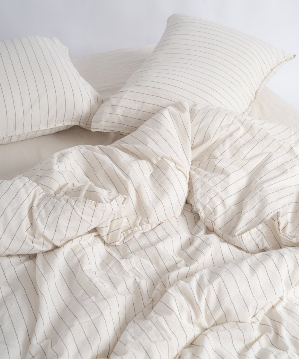 Garment washed 100% cotton duvet cover set in natural cream with black stripes
