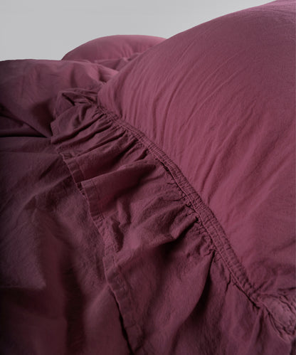 Raspberry stonewashed cotton duvet cover and pillowcase detail with envelope closure