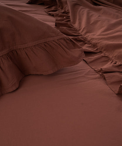 Close-up of stonewashed 100% cotton fabric in Cinnamon Stick showing soft texture and premium quality