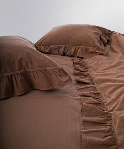 Stonewashed 100% cotton fabric texture showing soft, breathable and natural finish in wood smoke tone
